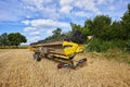 A mowing machine standing on a harvested field in the surrounding countryside of Ã¢â¬â¹Ã¢â¬â¹Berlin, Germany Royalty Free Stock Photo